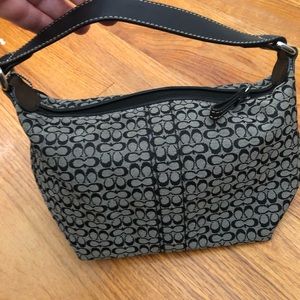Small coach purse.black never used